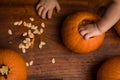 Toddler Reaching into a Pumpkin Royalty Free Stock Photo