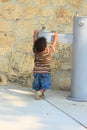 Toddler Reaching for Water Royalty Free Stock Photo