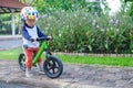 Toddler ridding balance bike Royalty Free Stock Photo