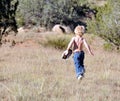 Toddler running outdoors Royalty Free Stock Photo