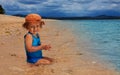 Toddler sitting in the water Royalty Free Stock Photo