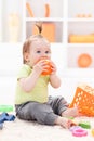 Toddler with soft baby toys