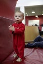 Toddler standing on sofa