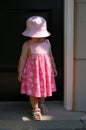 Toddler stepping out into the sunlight Royalty Free Stock Photo