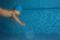 Toddler swimming in the pool