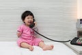 Toddler talking on the phone