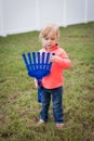 Toddler With Toy Rake