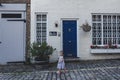 Toddler walking past the mews house in Bayswater, London