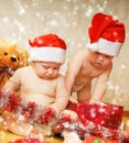 Toddlers in Christmas hats