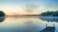 Toddy Pond, Maine with mist and wharf Royalty Free Stock Photo