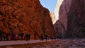 Tourists exploring the popular steep Todgha Gorge (also Todra) north of Tinghir in the south of Atlas Mountains.