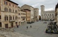 TODI, ITALY - APRIL 8, 2023: View of the Piazza del Popolo square with tourists, historic center of Todi, Perugia, Italy