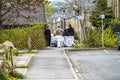 Todmorden , England - May 04 2018 : Refugees walking in the centre of Todmorden which meaning is death killing or