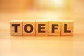 TOEFL, text words typography written on wooden lettering, english languange educational
