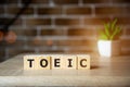 Toeic word on wooden cubes. Toeic concept Royalty Free Stock Photo