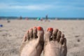 Toes covered in sand after fun day at the beach