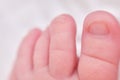 Toes on the foot of a newborn baby, close-up. Macro photo of a healthy toe of a child Royalty Free Stock Photo