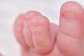 Toes on the foot of a newborn baby, close-up. Macro photo of a healthy toe of a child Royalty Free Stock Photo