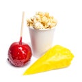 Toffee apple, sugared almonds, popcorn Royalty Free Stock Photo