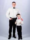 Toffs father and son in formal suit. small boy with dad businessman. family day. male fashion. parenting. fathers day