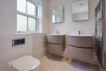Modern luxury washroom with two basins