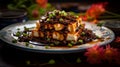 Tofu in black bean sauce: Cubes tofu bathed in a savory, glossy sauce with fermented black beans