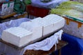 Tofu cheese at a market stall in a village near the historic town of Lijiang, Yunnan, China Royalty Free Stock Photo