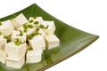 Asian food : Tofu cubes with spring onion on plate isolated white background Royalty Free Stock Photo