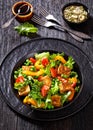 Tofu salad with greens and vegetables in bowl Royalty Free Stock Photo