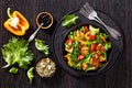 Tofu salad with greens and vegetables in bowl Royalty Free Stock Photo