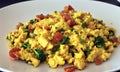 tofu scramble with tomatoes and broccoli, vegan breakfast Royalty Free Stock Photo