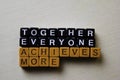 Together Everyone Achieves More TEAM on wooden blocks. Business and inspiration concept