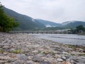 View of Togetsu-kyo Bridge and Katsura River in the morning, Arashiyama, Kyoto, Japan. Royalty Free Stock Photo