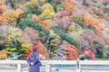 Togetsukyo bridge with colorful leaves mountains and Katsura river in Arashiyama, landmark and popular for tourists attractions in