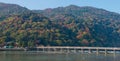Togetsukyo bridge and Hozu river in autumn season.