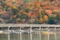 Togetsukyo bridge with multiple colour tree on the mountain background Royalty Free Stock Photo