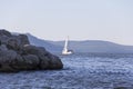 Yachting. A small yacht under sail on the reservoir Royalty Free Stock Photo