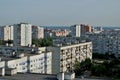 Panorama of residential areas of the summer city in the early morning from the height of the 16th floor of a residential building. Royalty Free Stock Photo
