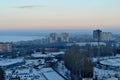 An early morning panoramic view of the snow-covered residential areas and the Volga River from the 21st floor of the hotel.