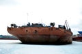 Panoramic view of the barge parked among the ice in the winter parking.