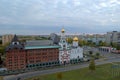 Panorama of the city on an early autumn morning with a view of the Volga Orthodox Institute and the Church of the Three Saints.