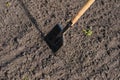 Toil work of ground. spade insert soil Royalty Free Stock Photo