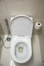 Toilet in the bathroom. ceramic toilet bowl indoors, top view .toilet bowl in bathroom. Royalty Free Stock Photo
