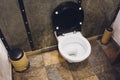 Toilet bowl with bidet shower in toilet. Royalty Free Stock Photo