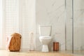 Toilet bowl near shower  in modern bathroom interior Royalty Free Stock Photo