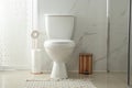 Toilet bowl near  stall in modern bathroom interior Royalty Free Stock Photo