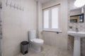 toilet and detail of a corner shower cabin with wall mount shower attachment Royalty Free Stock Photo