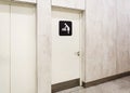 toilet doors for female genders, icon of person changing a baby's diapers. room for mother and child