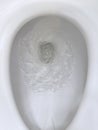 Toilet, Flushing Water, close up Royalty Free Stock Photo