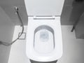 Toilet, Flushing Water, flush toilet, white toilet, Close-up the toilet Royalty Free Stock Photo